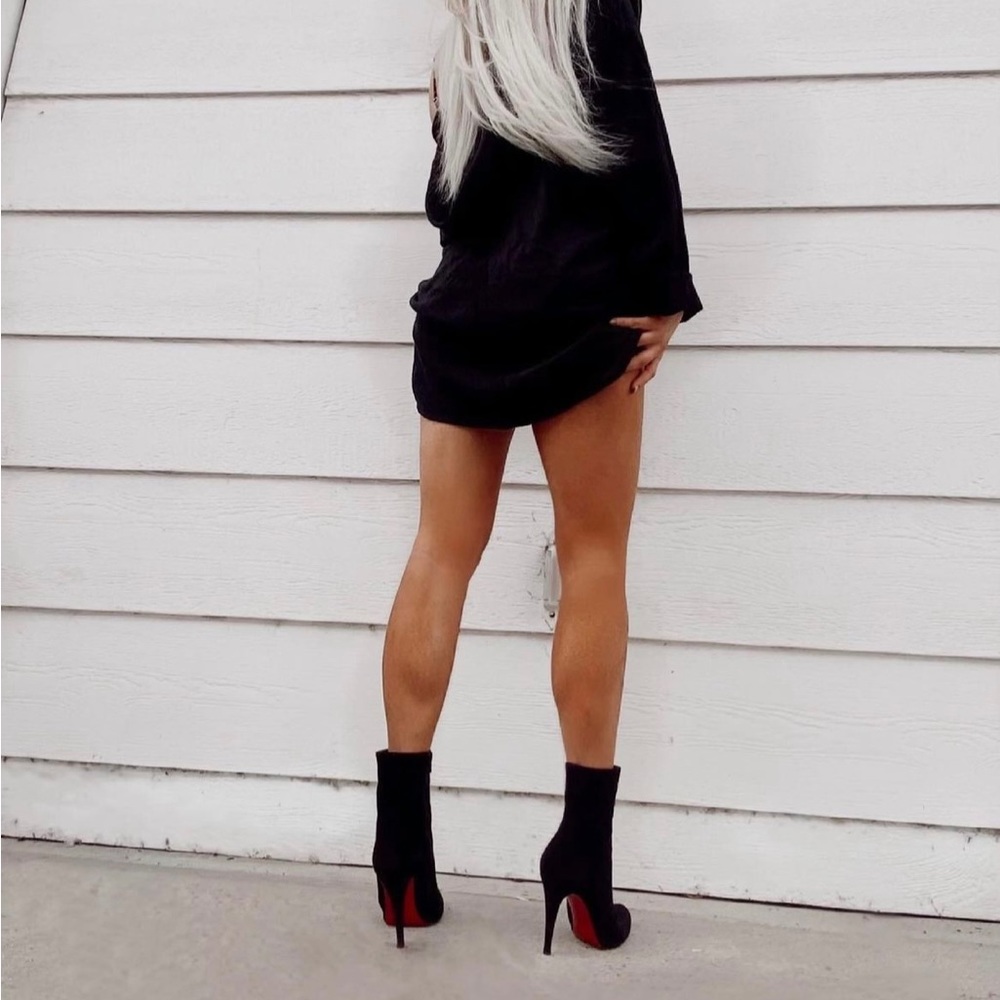 Black Christian Louboutin boots